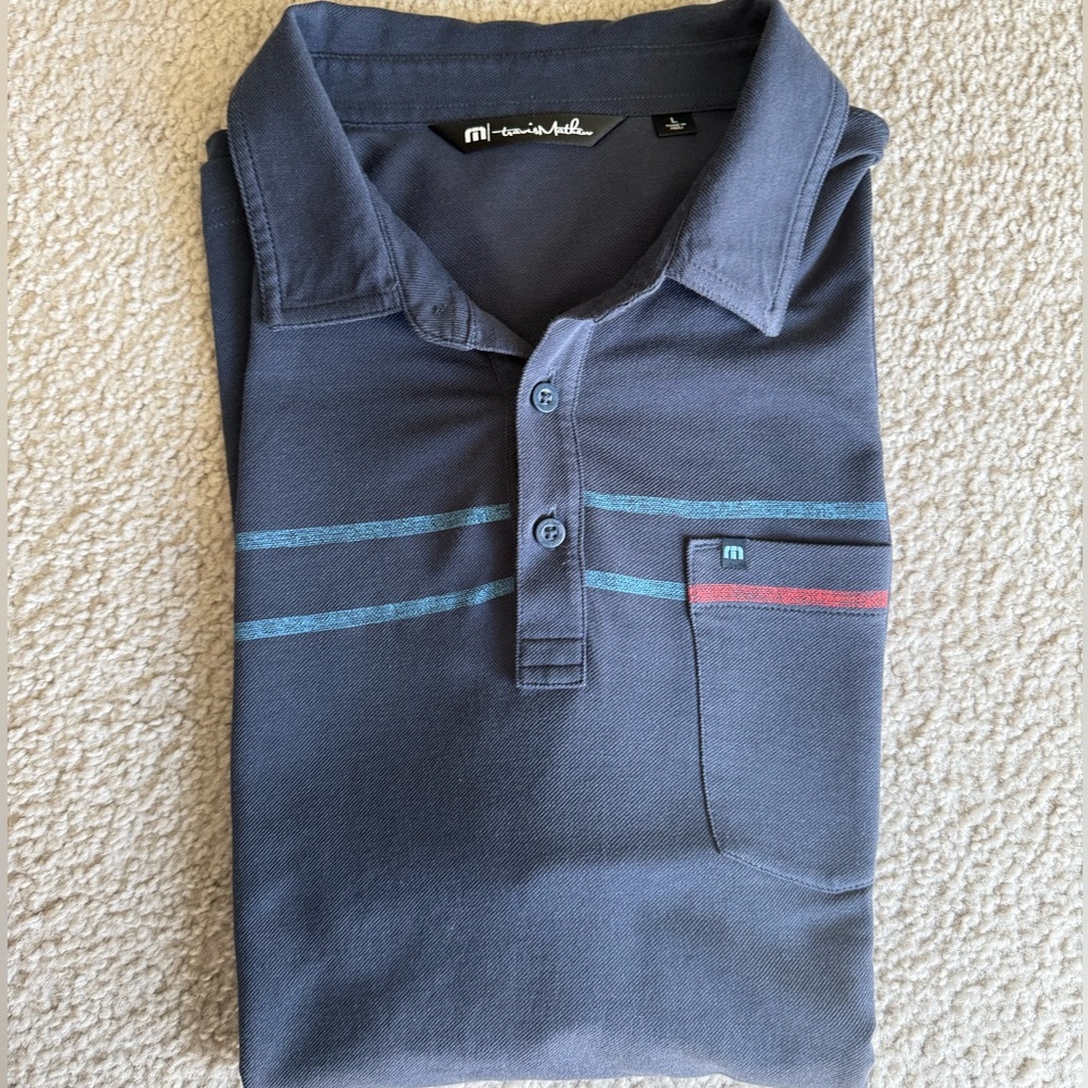 Travis Mathew Navy Polo with Teal and Red Stripes